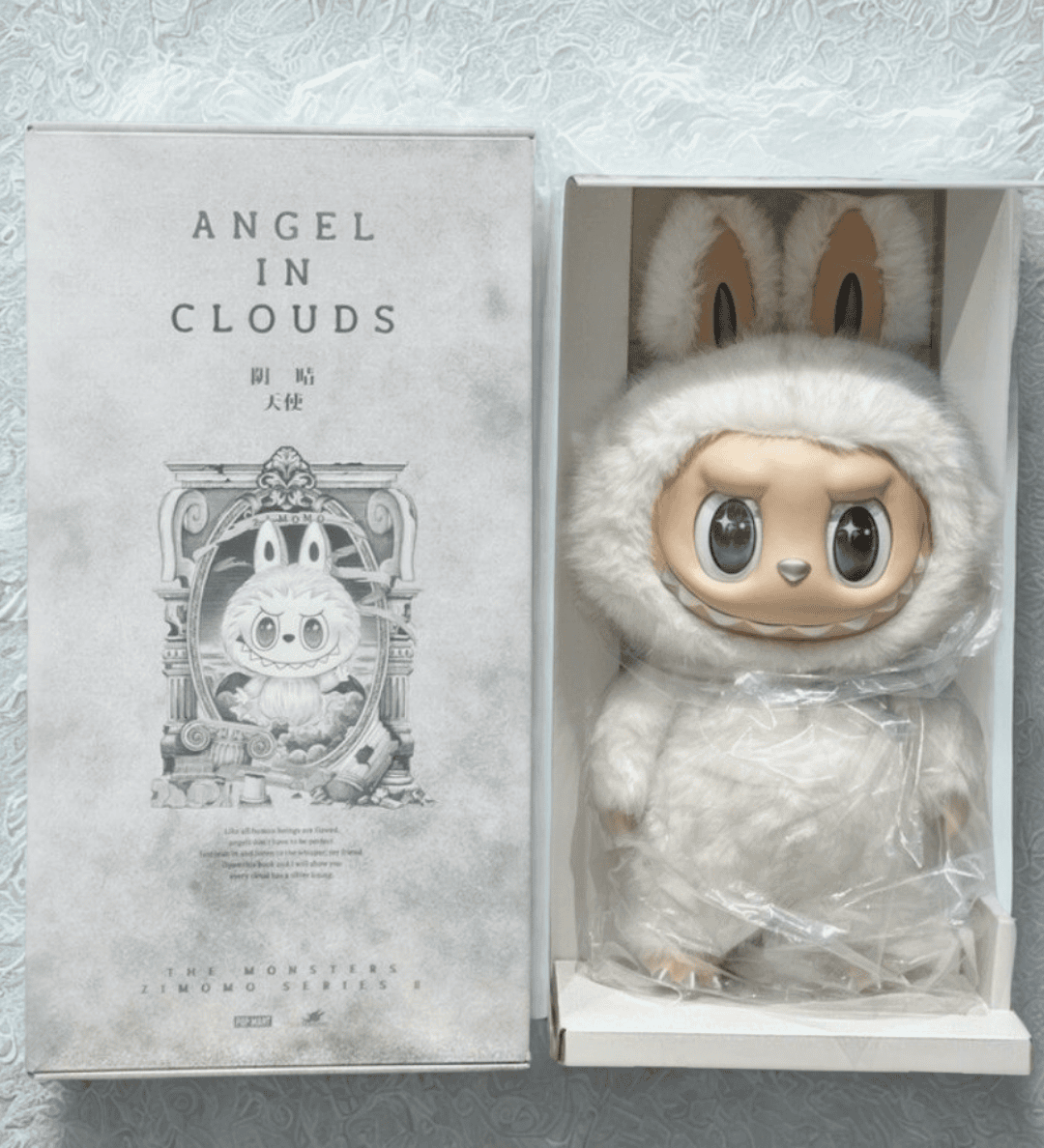 ZIMOMO ANGEL IN CLOUDS